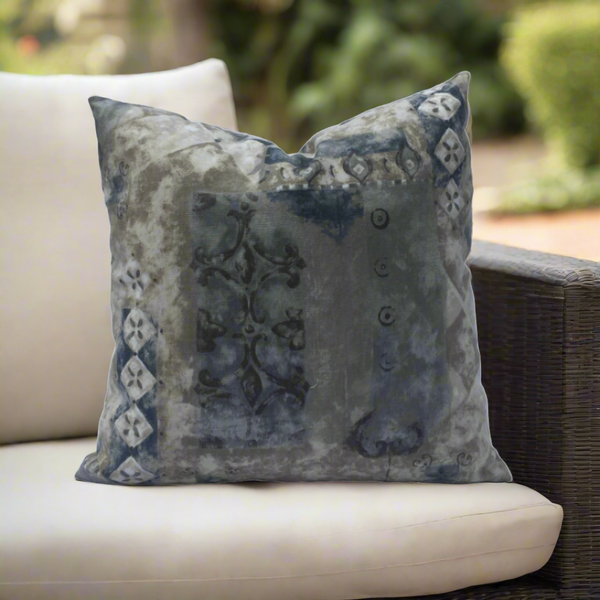 throw pillow with a mix of colors blue grey and white twently inches by twenty inches